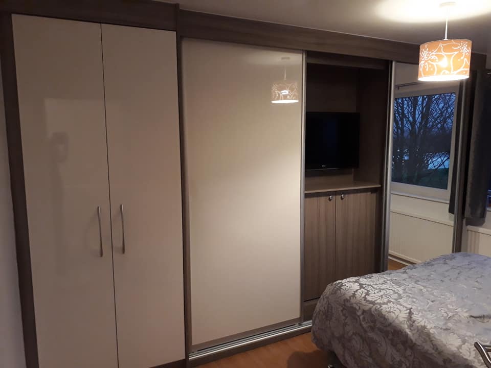 TV and storage behind the door